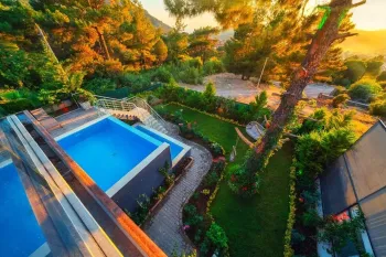 Ovacik contemporary home with indoor and outdoor pool